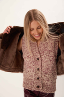 SHORT BROWN NATURAL SHEEPSKIN WITH STRAPES